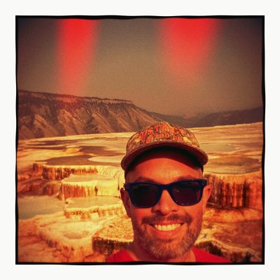 Plastique 120: a sunglasses selfie at hot springs, red leaks hanging from the top